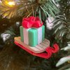 Decoratief cadeau - ornament op slee (kleine versie) - 3dbende