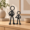 Stickyman Bakoma met kleinkind in een warm interieur