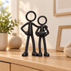 Stickyman Pas Opa en Oma met baby in een warm interieur