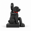 Zijaanzicht vanaf de kant van de hond van de zittende Stickyman-decoratie.